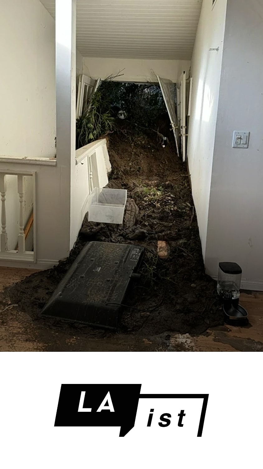 Landslide debris in a hallway of a house.