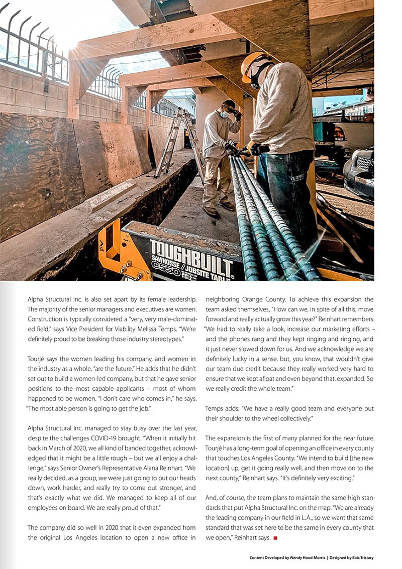 Building facade with open windows against blue sky