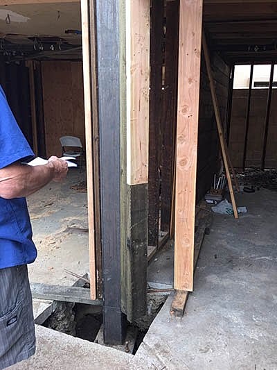 Indoor construction with exposed support beams.