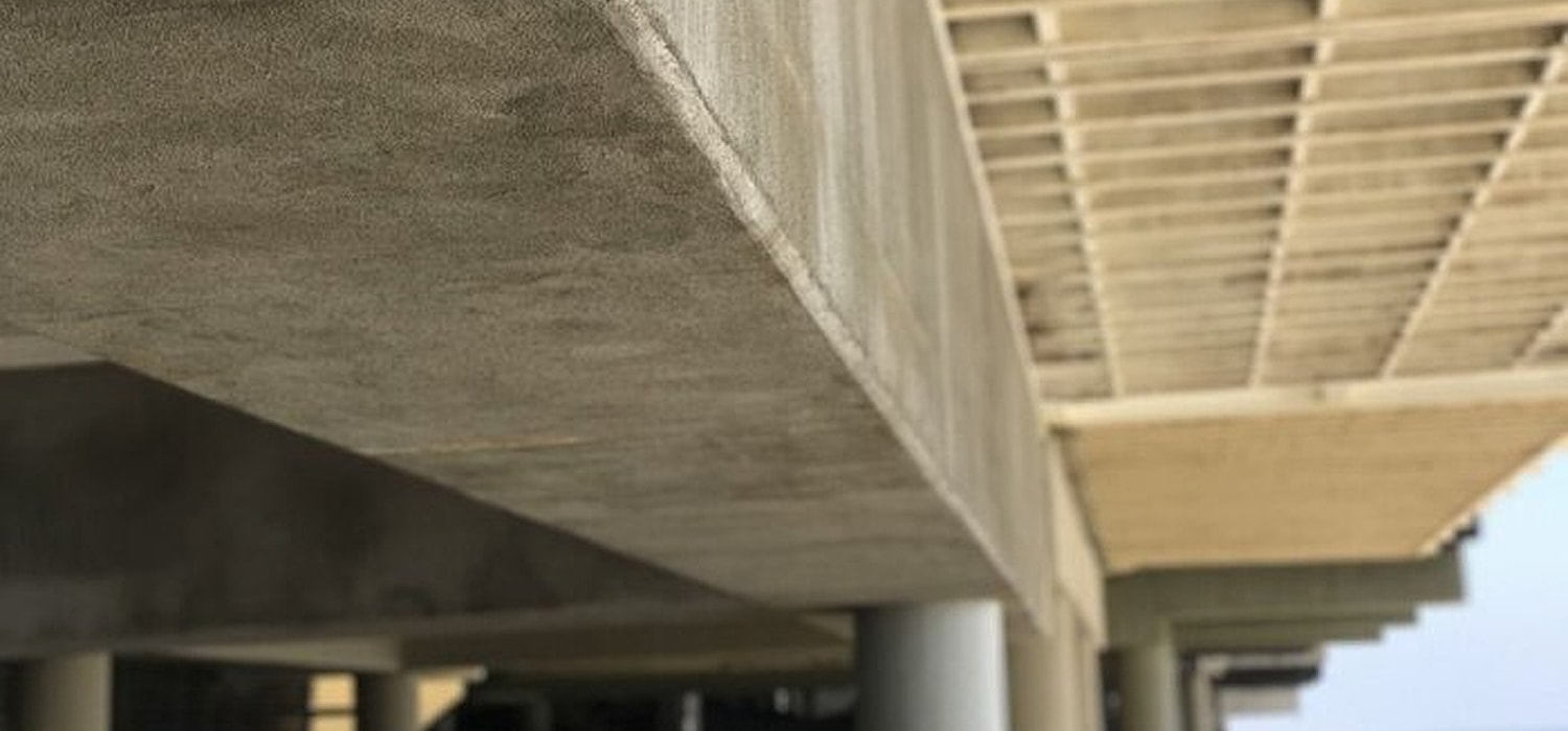 Concrete structure viewed from an upward angle.