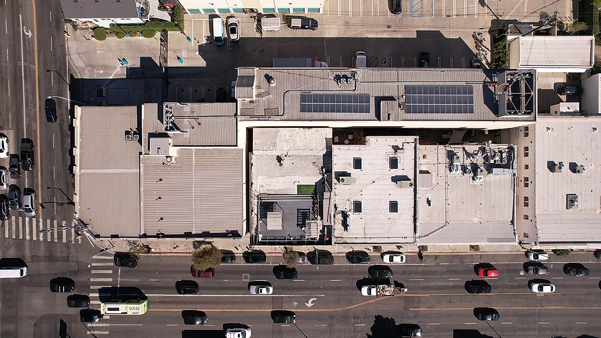 Aerial view of city buildings and traffic.