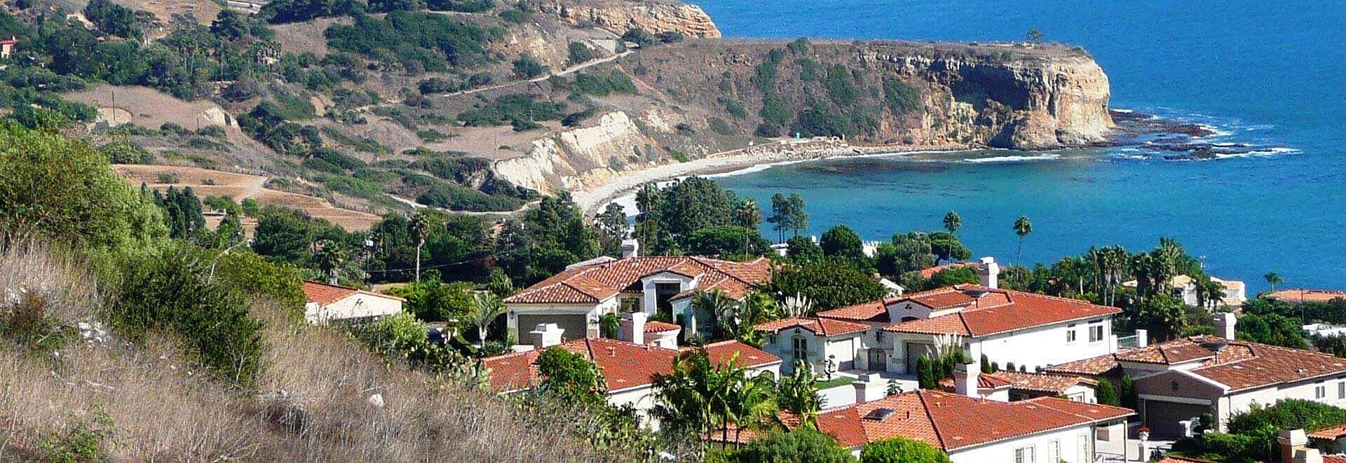 Worker repairing an oceanfront structure underneath.
